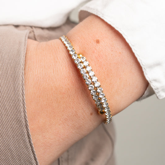 Pulsera cruzada circones bañado en oro