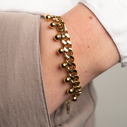 Pulsera diseño eslabones y esferas bañado en oro