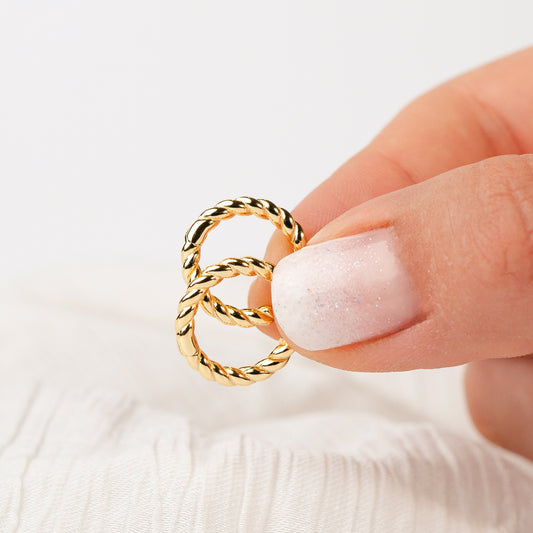 Aros argolla twist bañados en oro