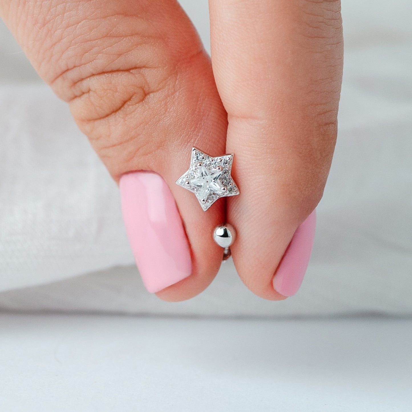 Aros pegados estrella cierre pelotita