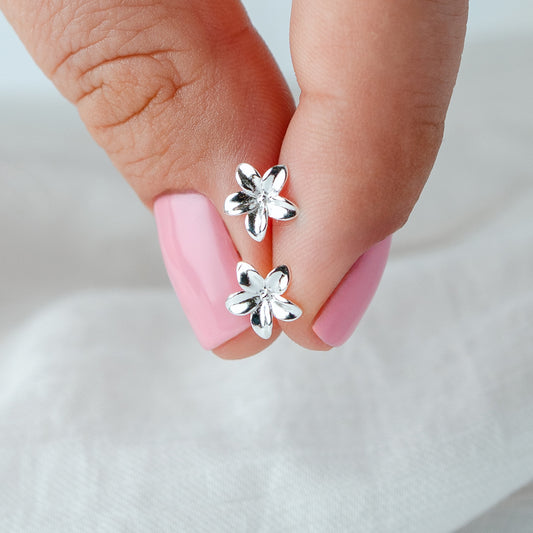 Aros pegados flor cierre pelotita