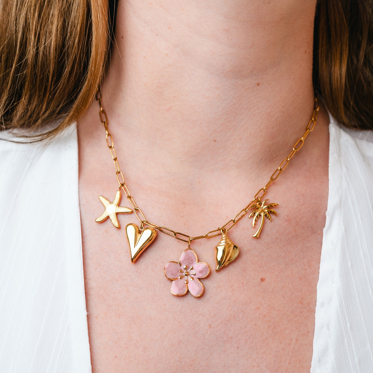 Collar flor y chiches bañado en oro