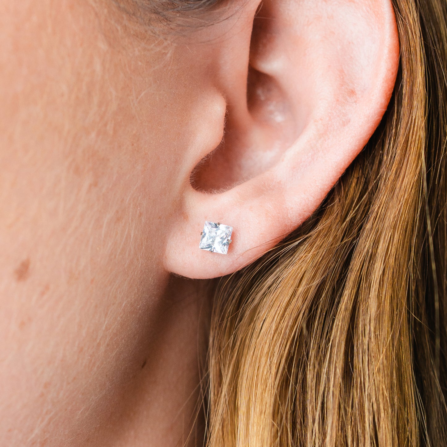 Aros pegados circón cuadrado cierre pelotita