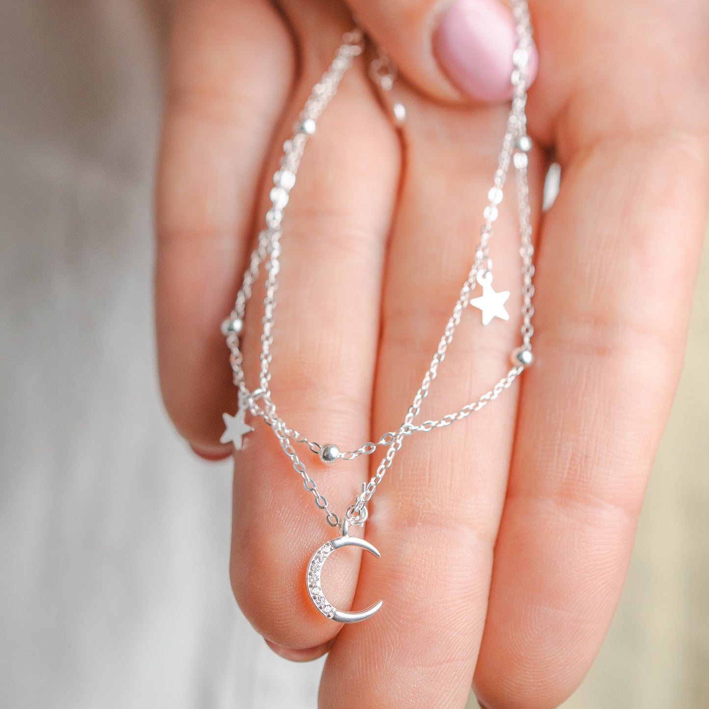 Pulsera doble media luna y estrellas