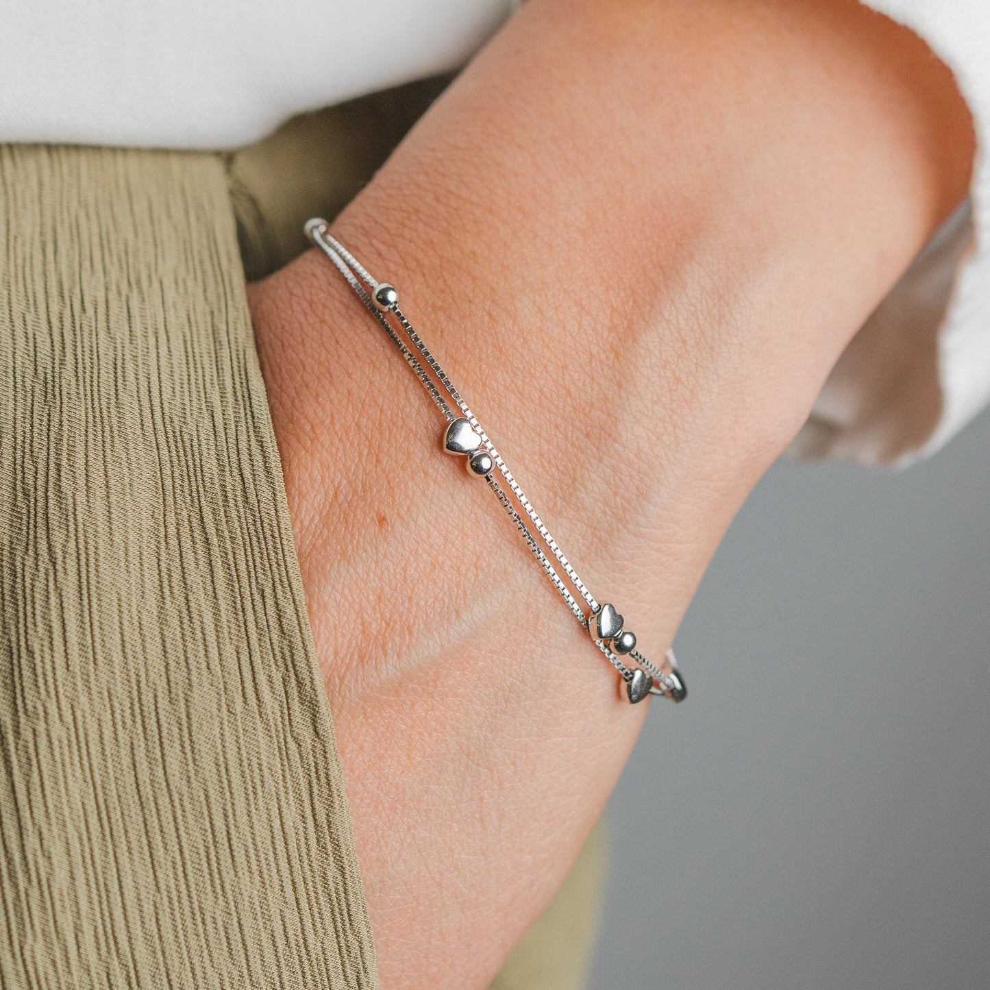 Pulsera doble corazones mini