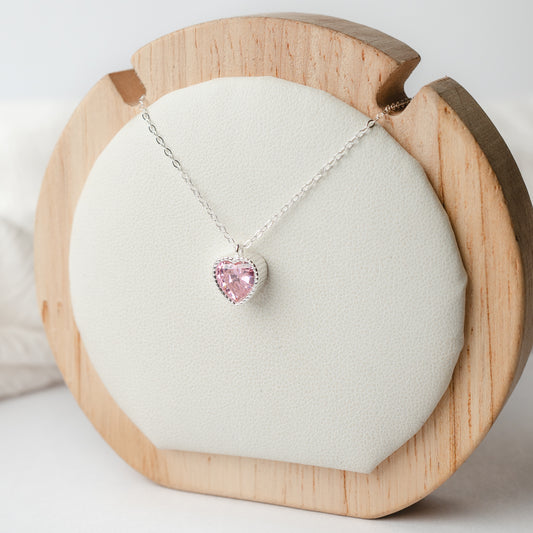 Collar punto de luz corazón rosado