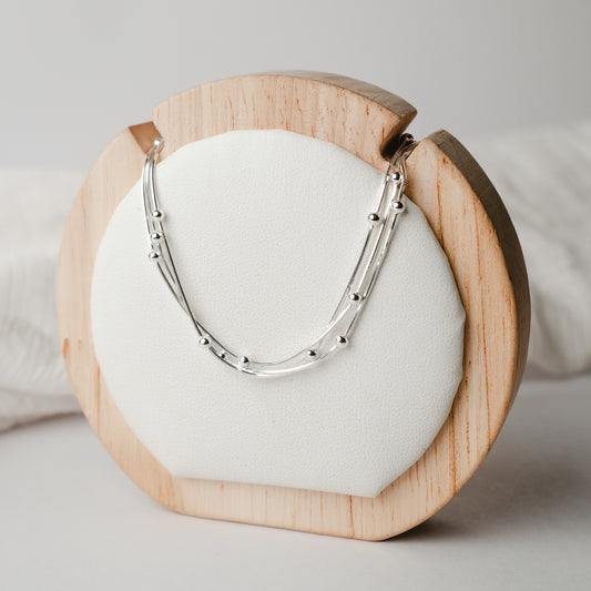 Collar triple esferas