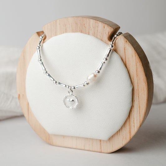 Collar de corazón mostacillas y una perla