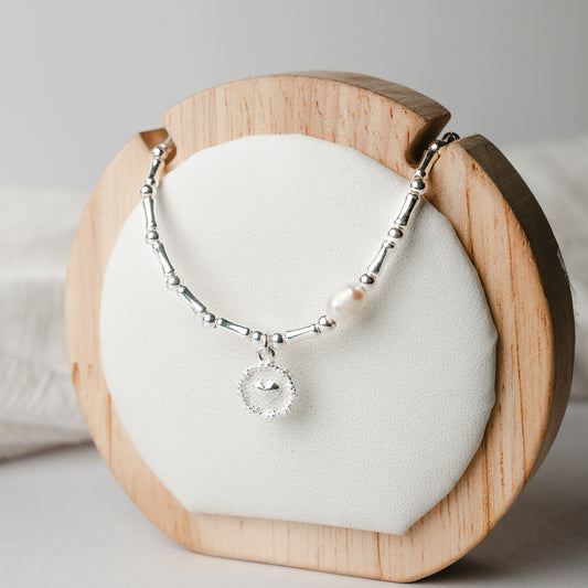 Collar de corazón mostacillas y una perla