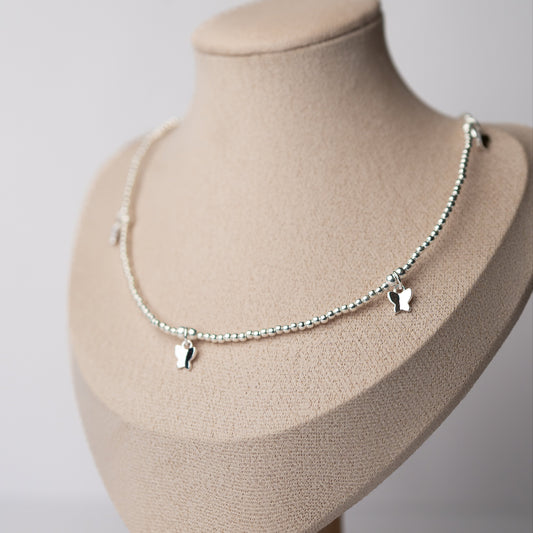 Collar chocker de mostacillas y mariposas