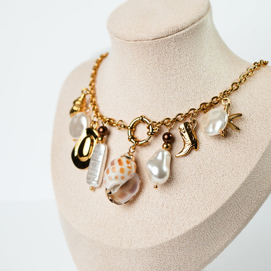 Collar conchita y chiches bañado en oro