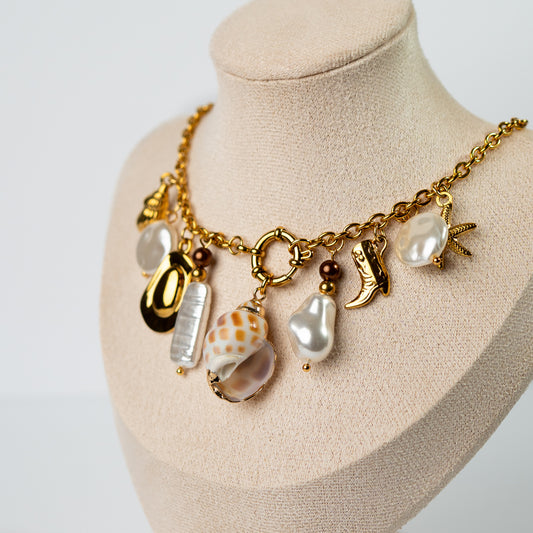 Collar conchita y chiches bañado en oro