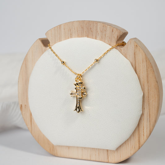 Collar dos cruces bañado en oro
