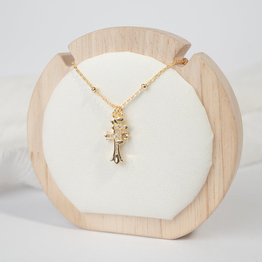 Collar dos cruces bañado en oro