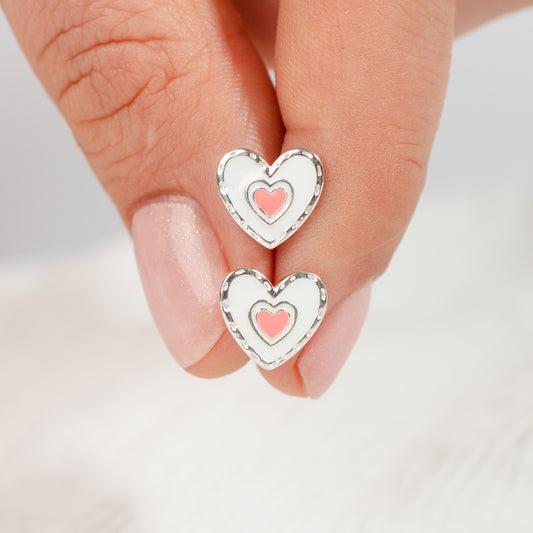 Aros pegados corazón blanco y rosado