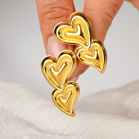 Aros pegados corazones bañado en oro