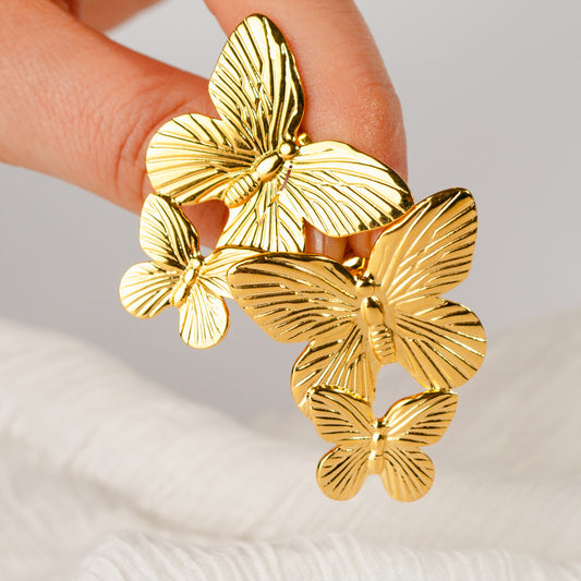 Aros pegados dos mariposas