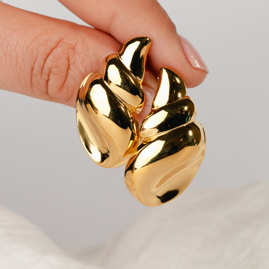 Aros pegados conchita bañado en oro