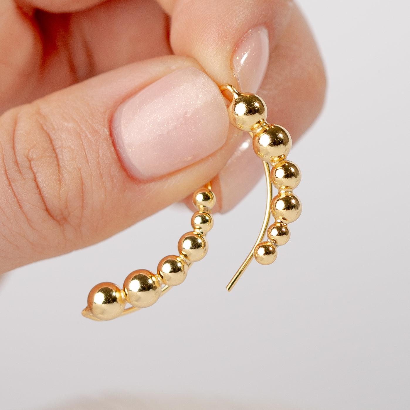 Aros trepadores esferas bañado en oro