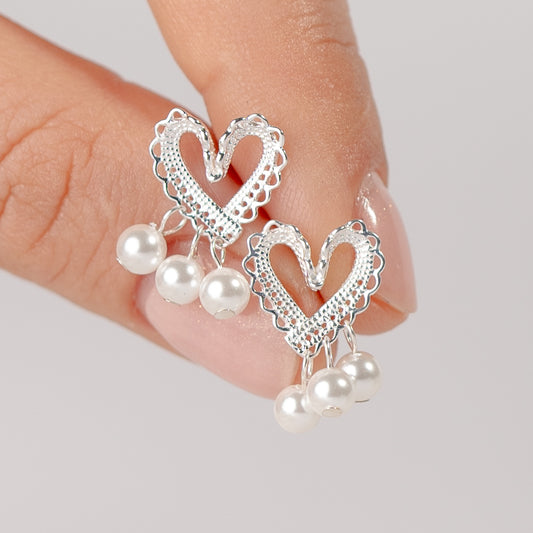 Aros pegados corazón y perlas