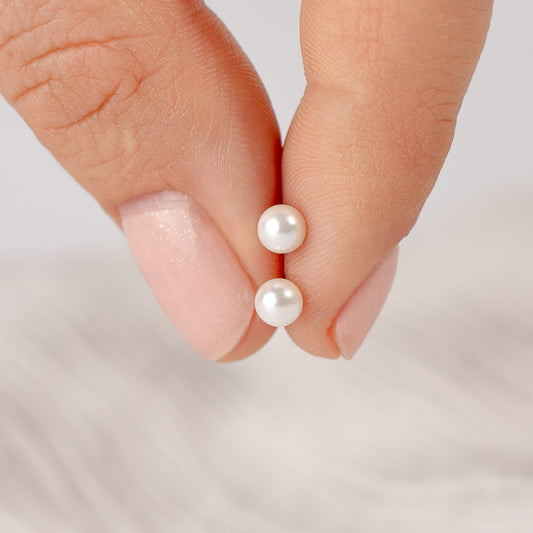 Aros pegados perla con tope