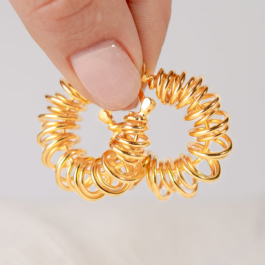 Aros argolla espiral bañado en oro