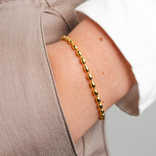 Pulsera mostacillas ovaladas bañado en oro