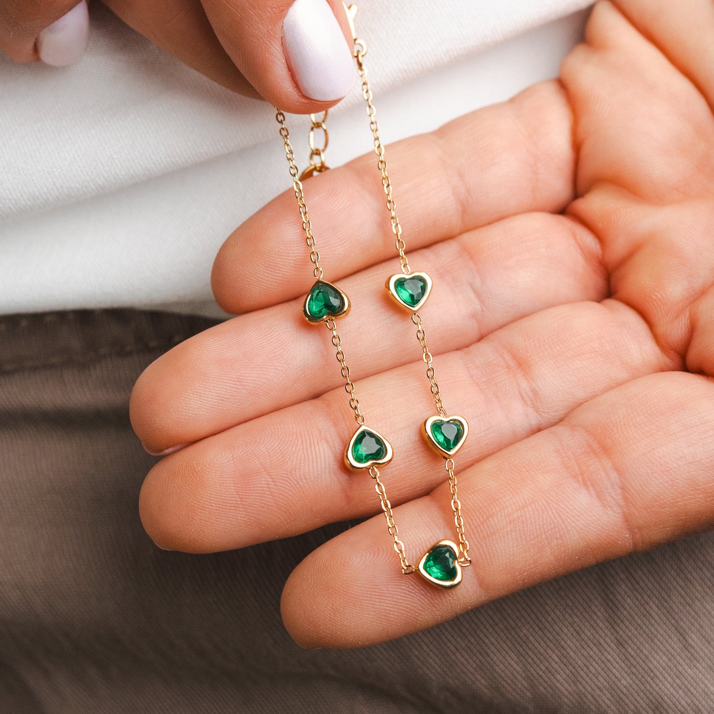 Pulseras corazones verdes bañado en oro
