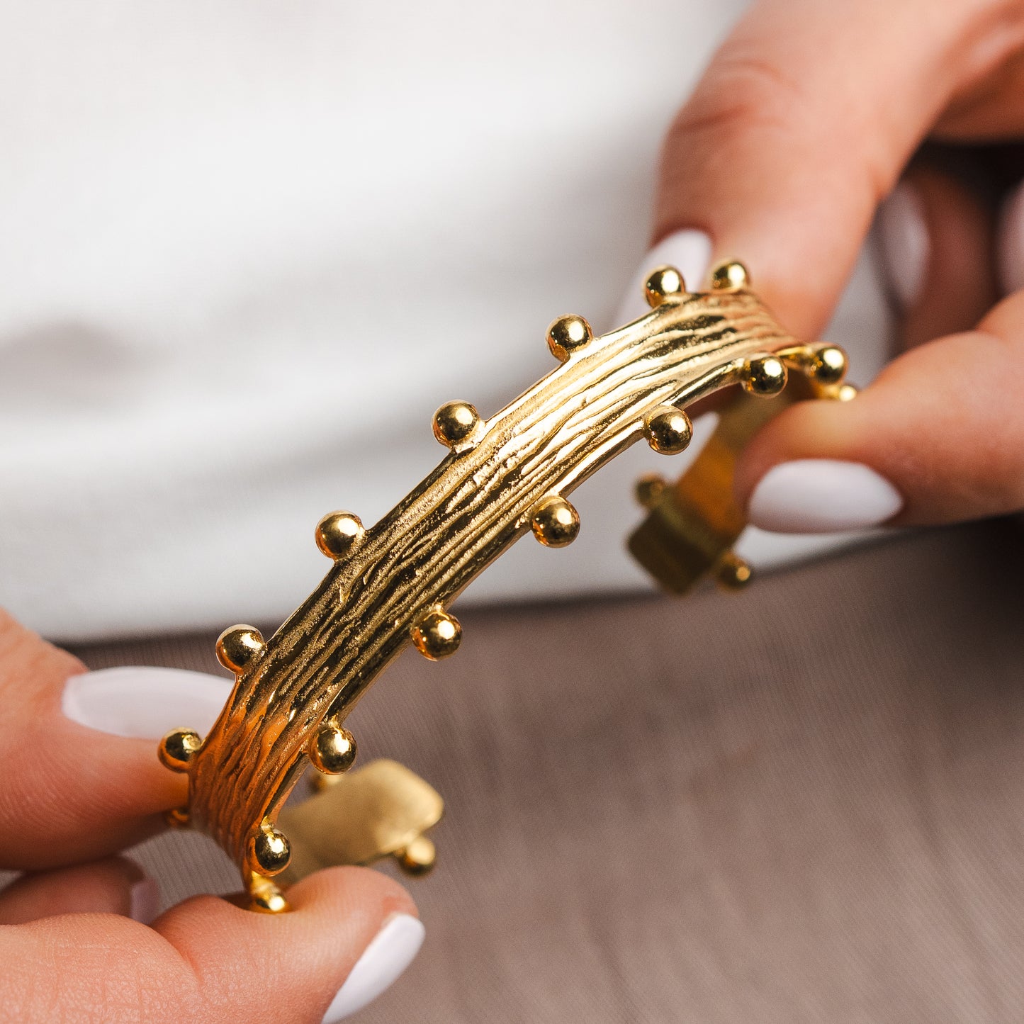 Pulsera esclava esferas bañado en oro