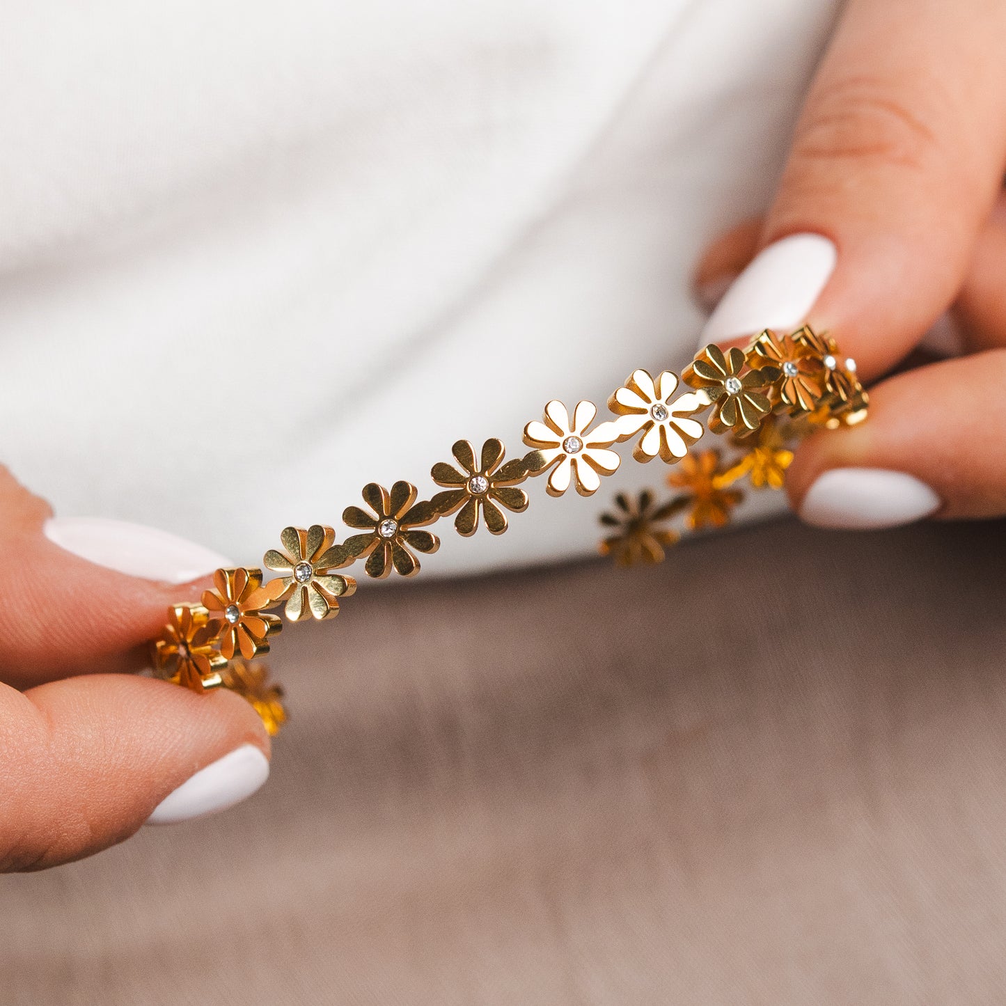 Pulsera esclava flores bañado en oro