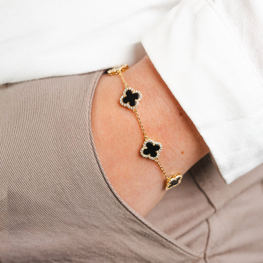Pulsera trébol negro circones bañado en oro