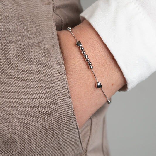 Pulsera corazones y esferas