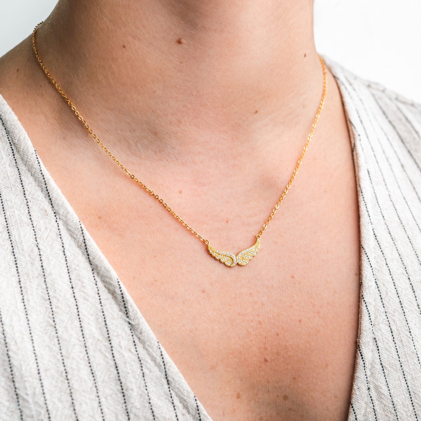 Collar alas circones bañado en oro