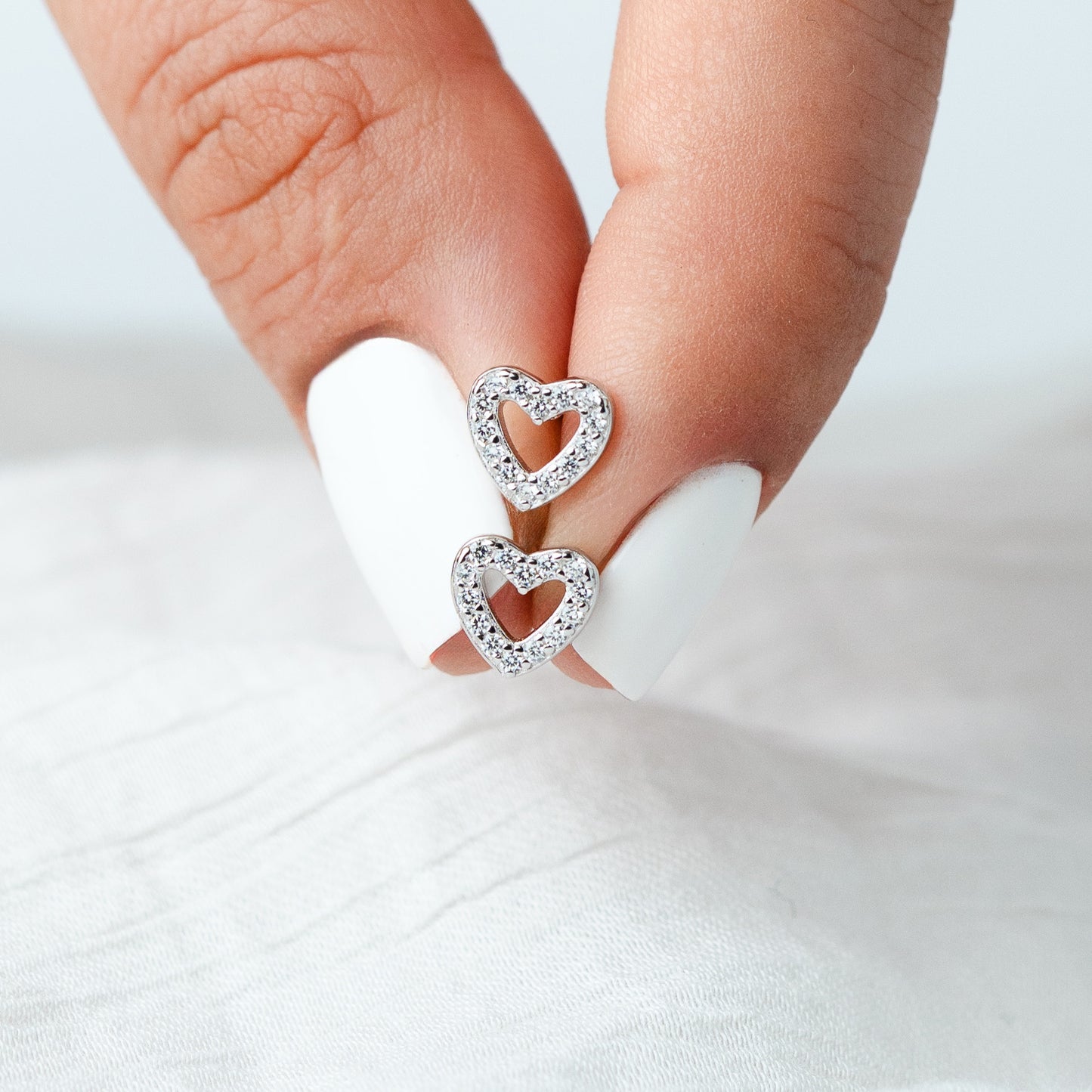 Aros pegados corazón circones cierre pelotita