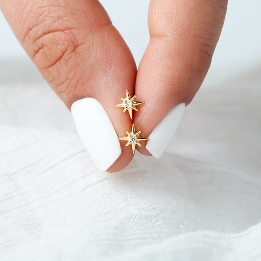 Aros pegados mini star cierre pelotita bañado en oro