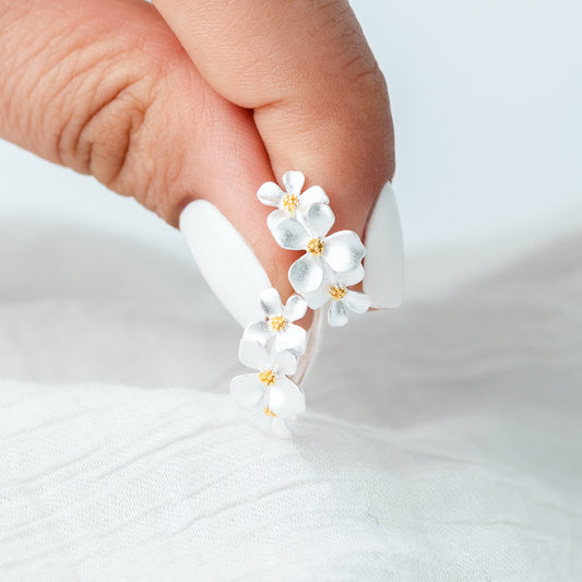 Aros argolla huggie flores