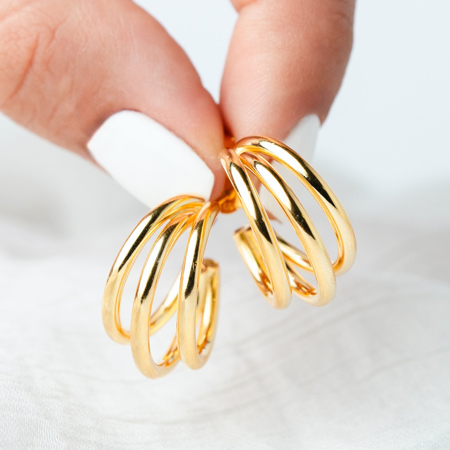 Aros semi argolla triple bañado en oro