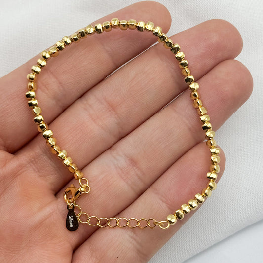 Pulsera mostacillas bañado en oro