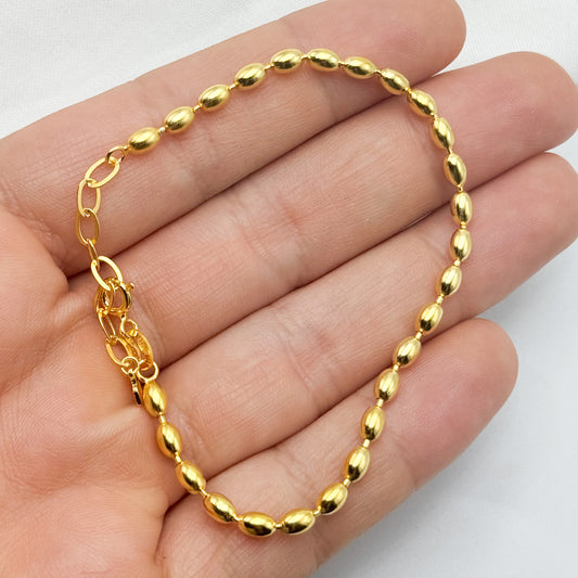 Pulsera mostacillas ovaladas bañado en oro