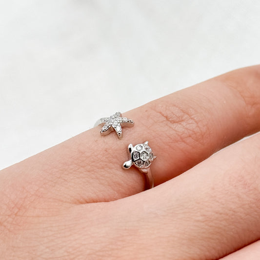 Anillo de tortuga y estrella circones