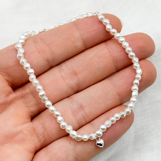 Pulsera perlas y corazón