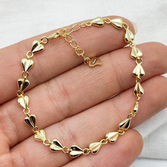 Pulsera corazones bañado en oro