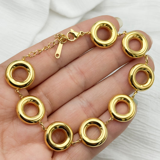 Pulsera círculos bañado en oro