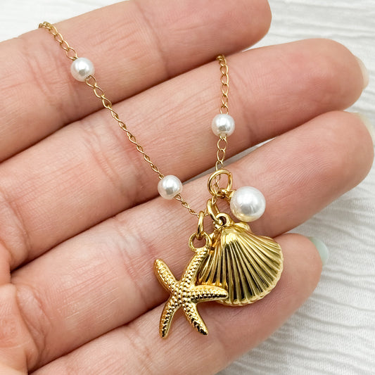Tobillera estrella de mar y conchita bañado en oro