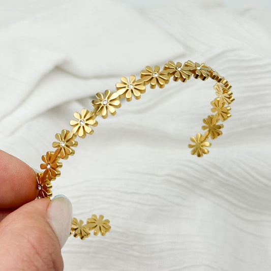 Pulsera esclava flores bañado en oro