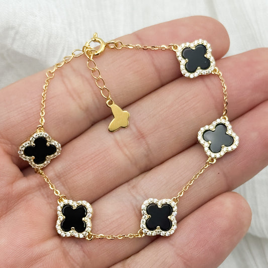 Pulsera trébol negro circones bañado en oro